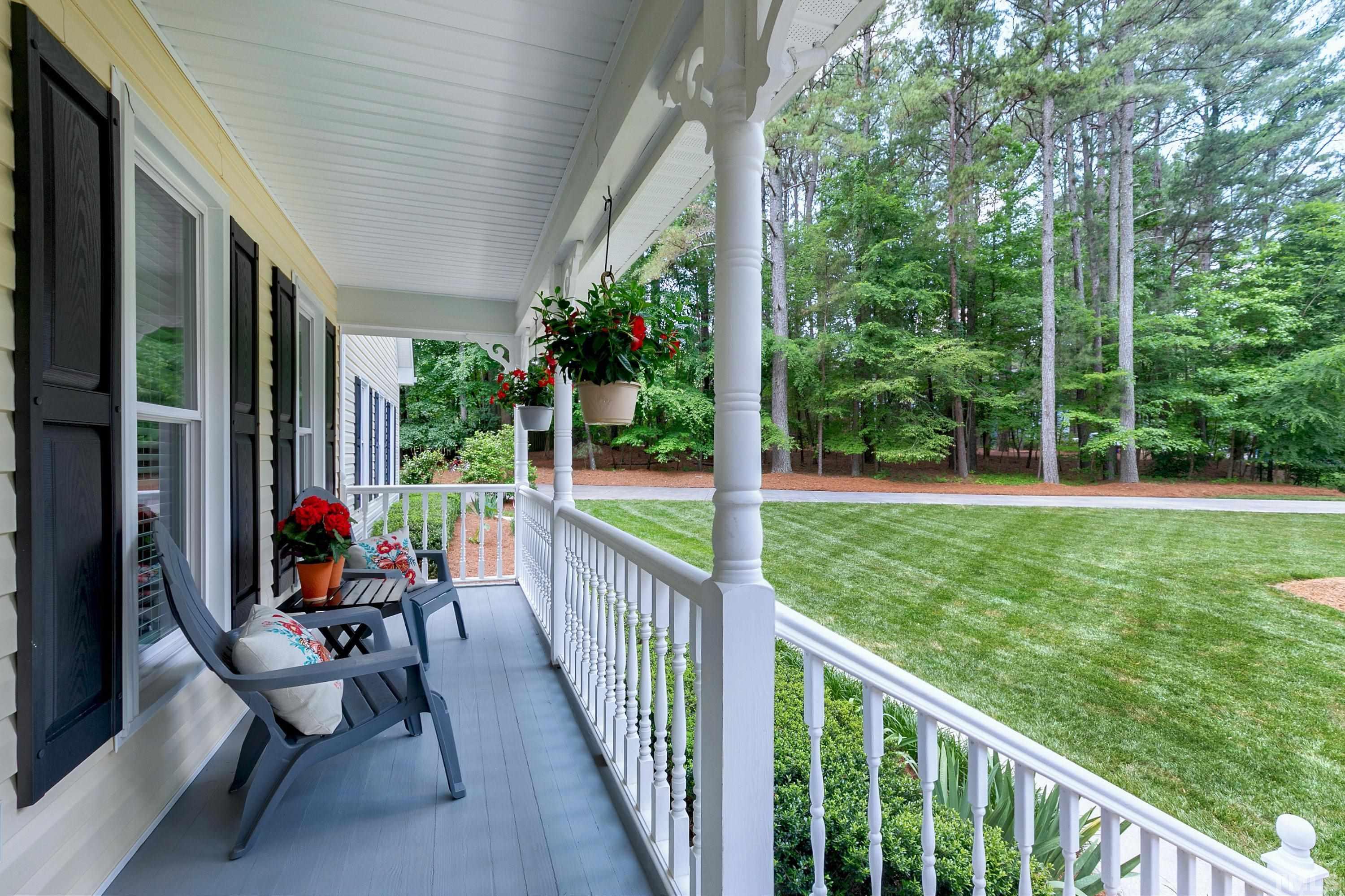 2905 Kenwick Court Raleigh, NC 27613 - Photo 2 of 45 a view of a two chair and table in patio of a house