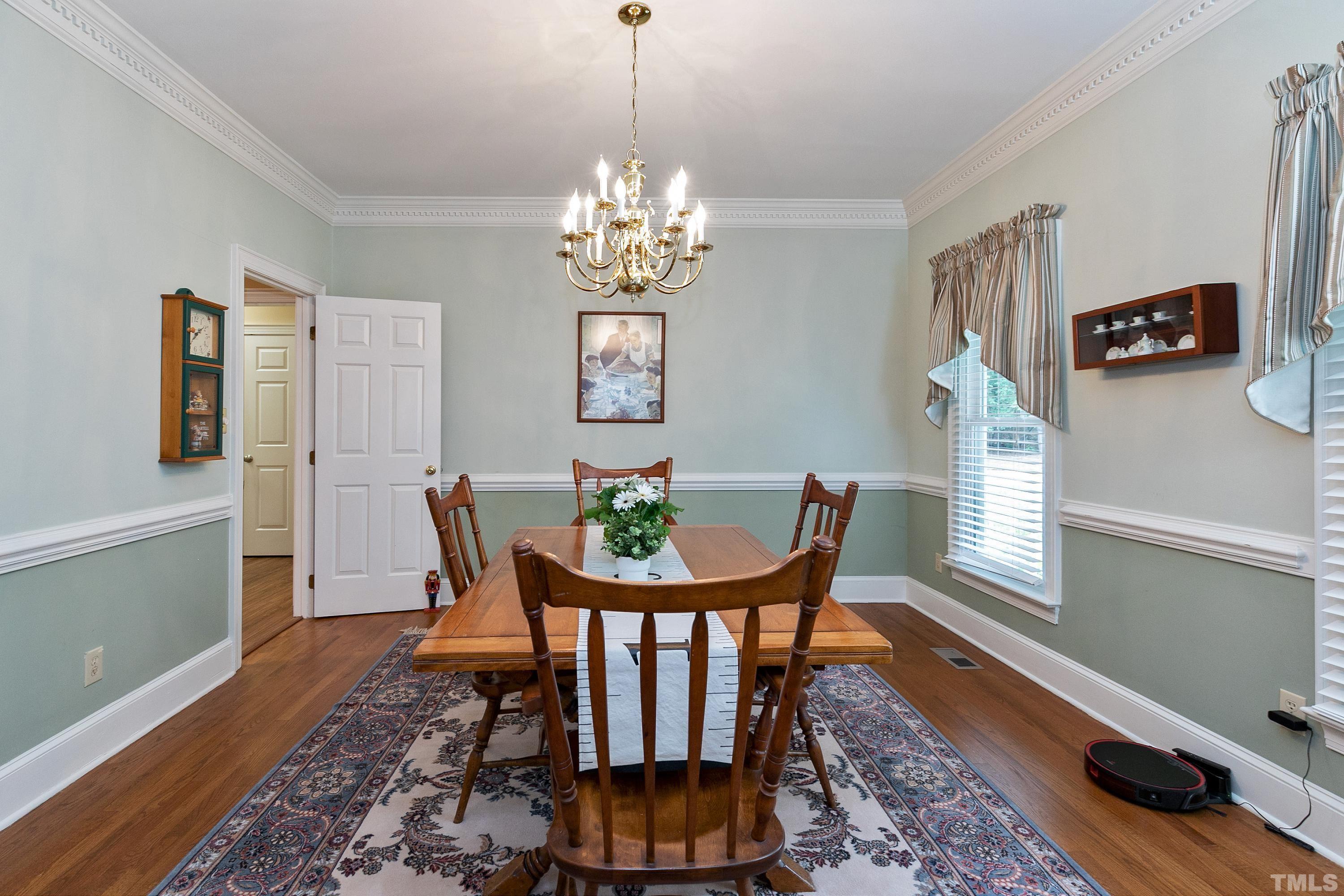 2905 Kenwick Court Raleigh, NC 27613 - Photo 3 of 45 a view of a dining room with furniture and window