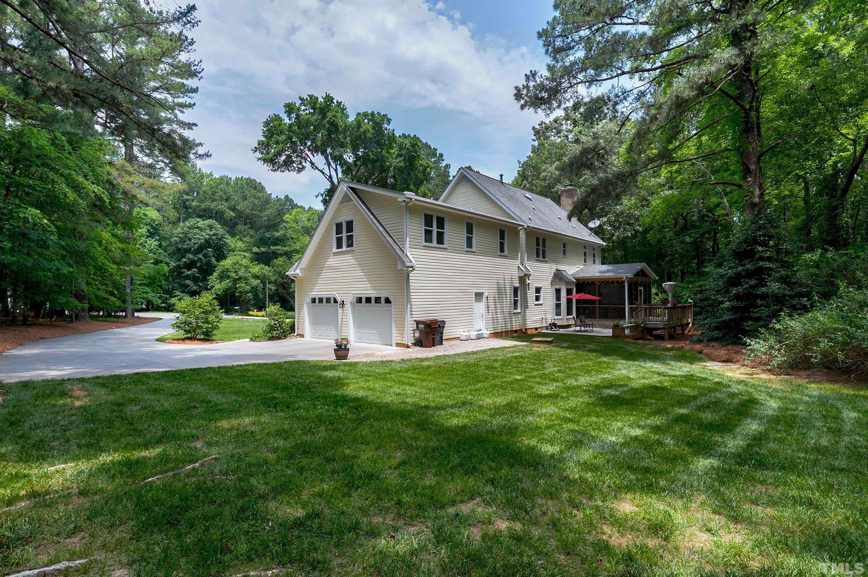 2905 Kenwick Court Raleigh, NC 27613 - Photo 36 of 45 a front view of house with yard and green space