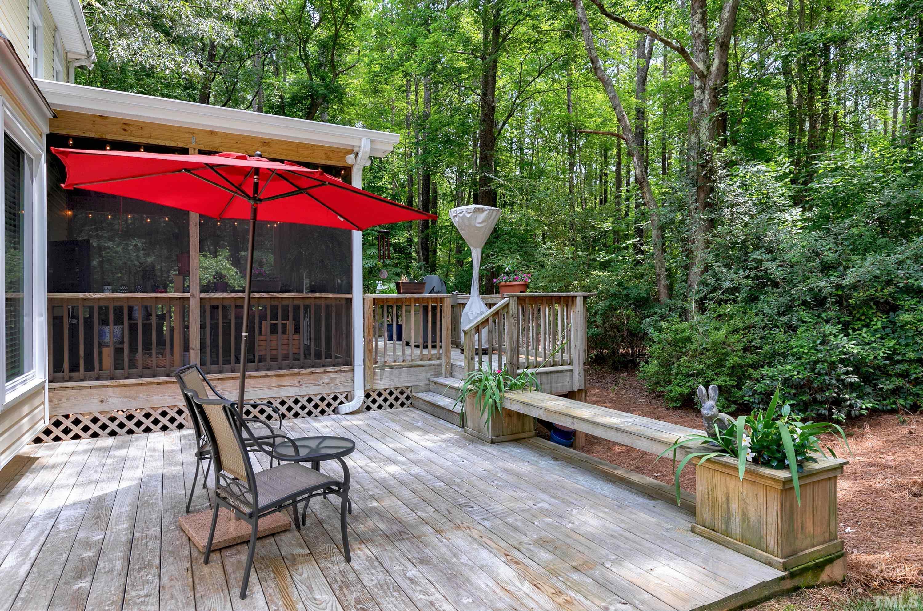 2905 Kenwick Court Raleigh, NC 27613 - Photo 38 of 45 a view of a chair and table on the wooden floor