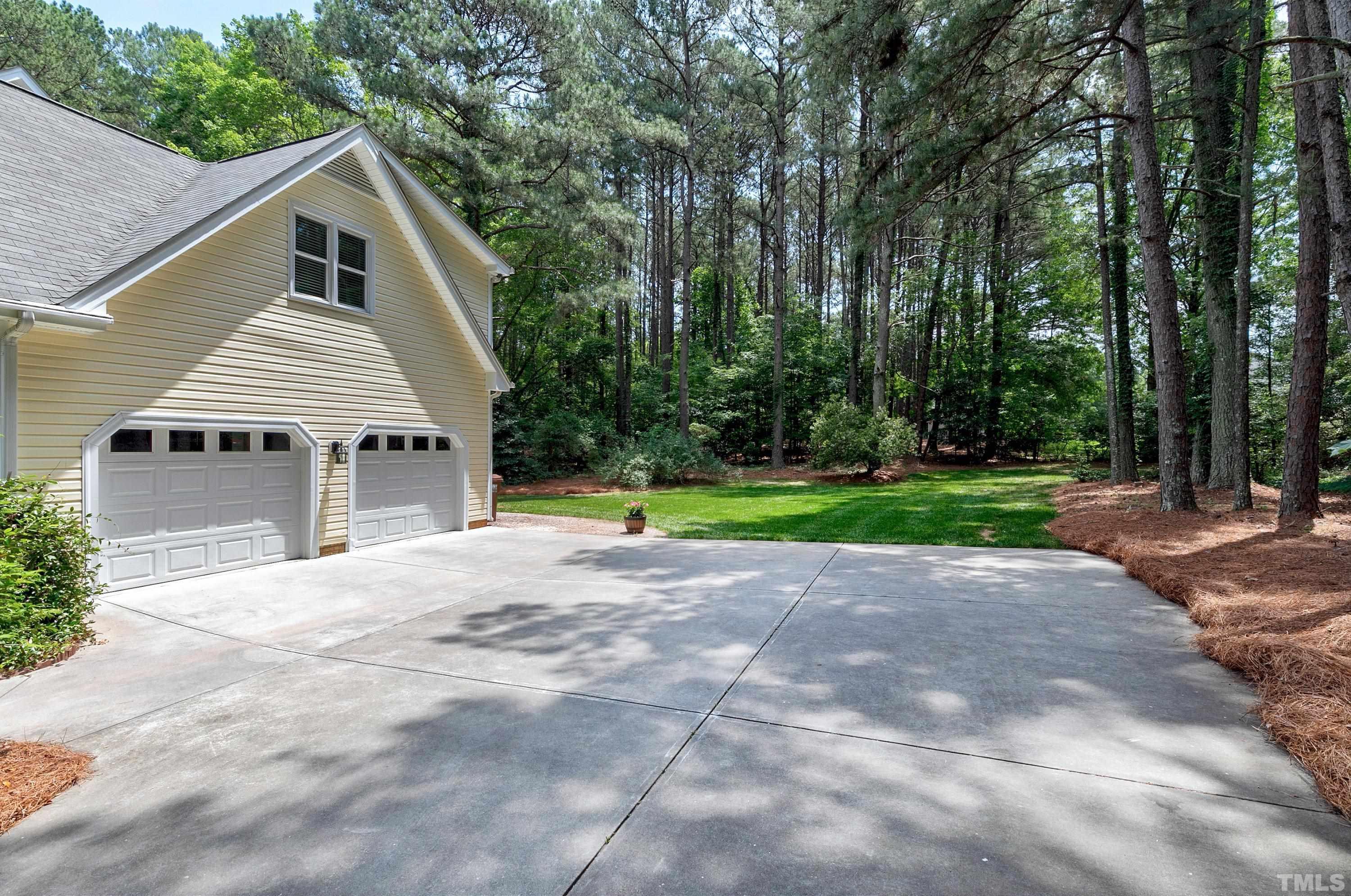 2905 Kenwick Court Raleigh, NC 27613 - Photo 45 of 45 a front view of a house with a yard
