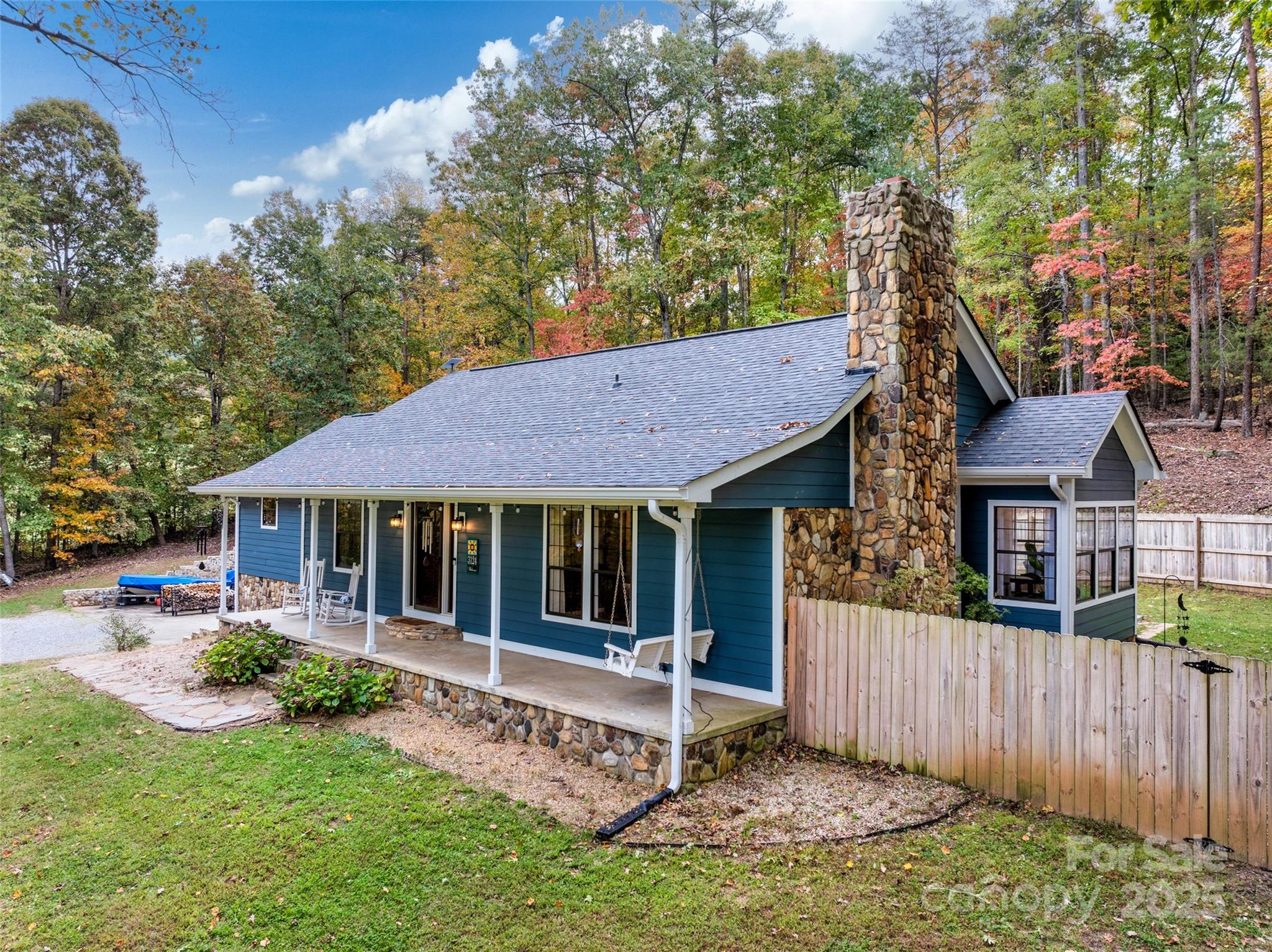 3124 Clark Loop Morganton, NC 28655 - Photo 2 of 48 a view of a house with a yard and large tree