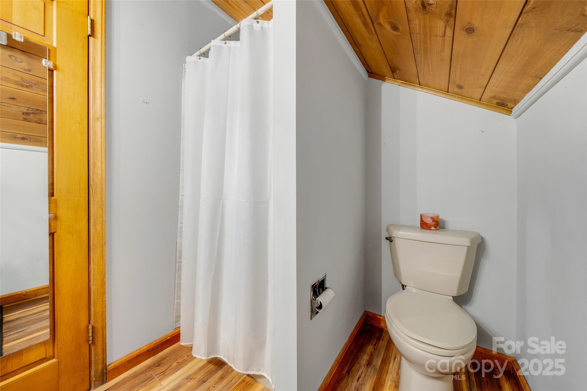 3124 Clark Loop Morganton, NC 28655 - Photo 28 of 48 a white toilet sitting next to a small yard