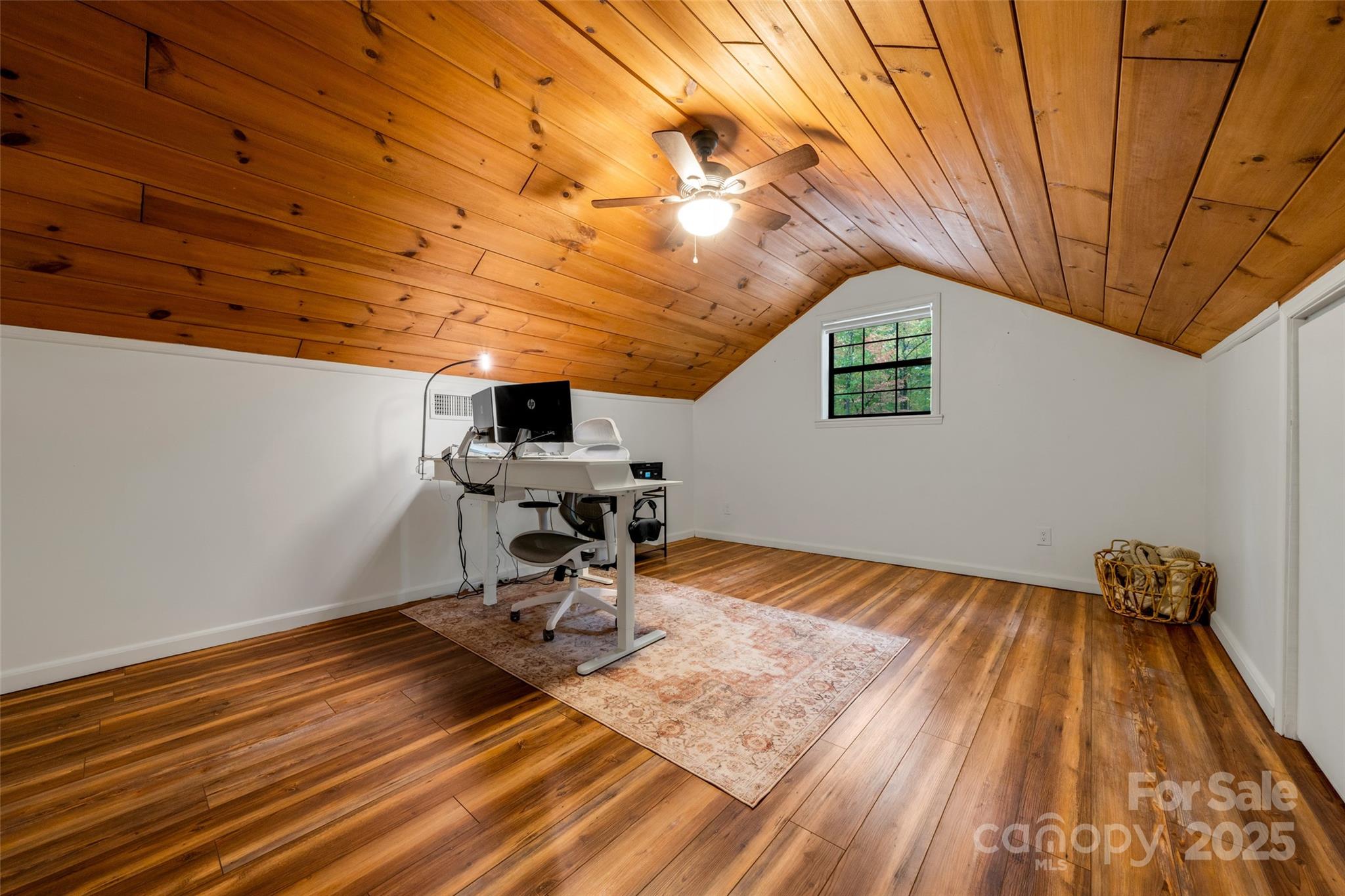 3124 Clark Loop Morganton, NC 28655 - Photo 29 of 48 a view of a room with wooden floor and chair