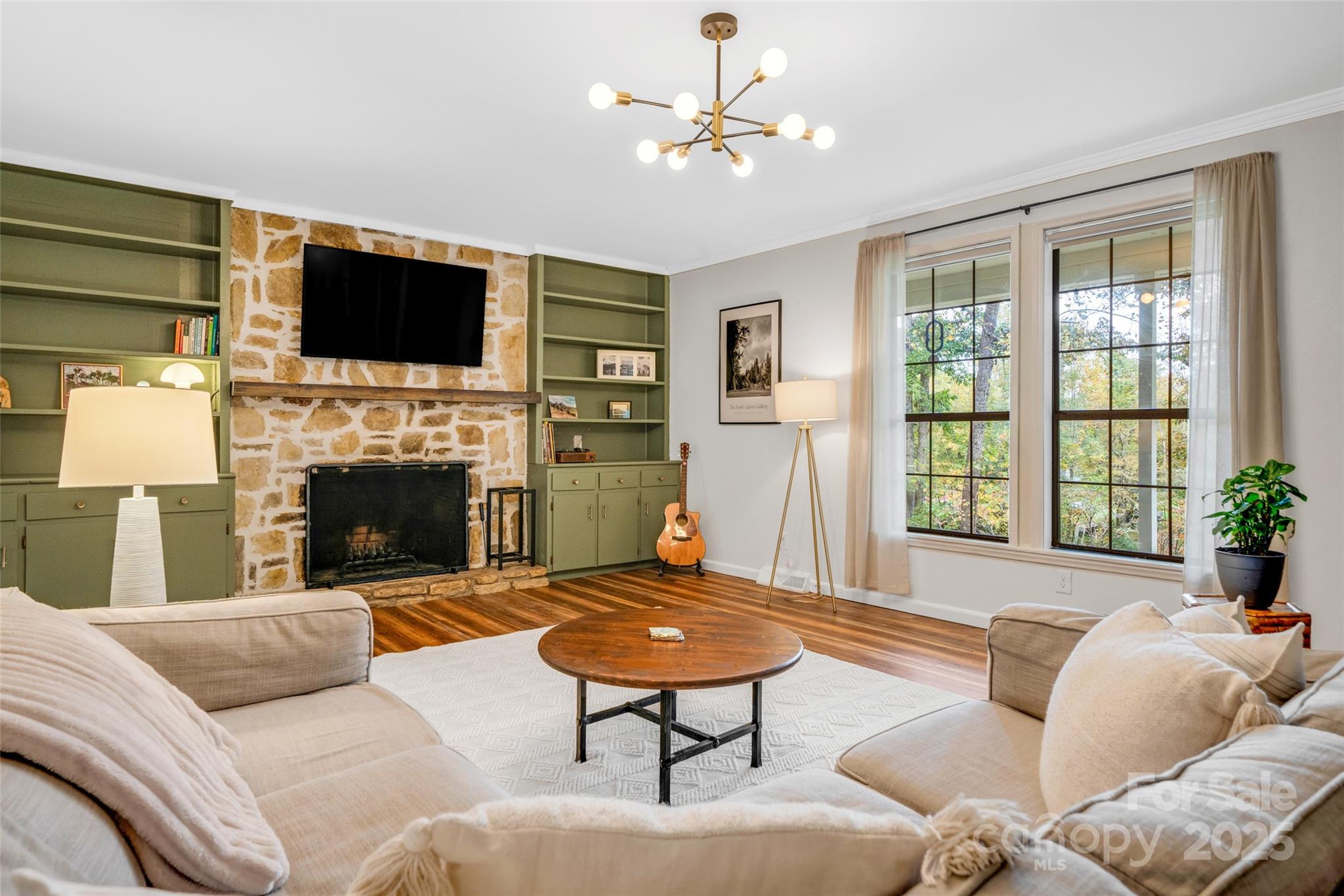 3124 Clark Loop Morganton, NC 28655 - Photo 6 of 48 a living room with furniture fireplace and a flat screen tv