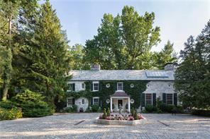 This Brittany styled Danby marble stone home has gorgeous Hudson River views! The original courtyard with the lovely fountain and garden is modeled after an Italian Villa..simply stunning!