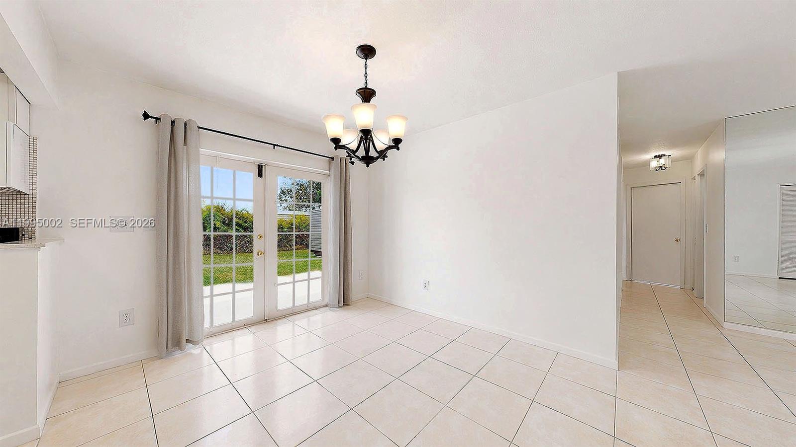 15305 Southwest 104th Avenue Miami, FL 33157 - Photo 23 of 46 a view of an empty room with a window