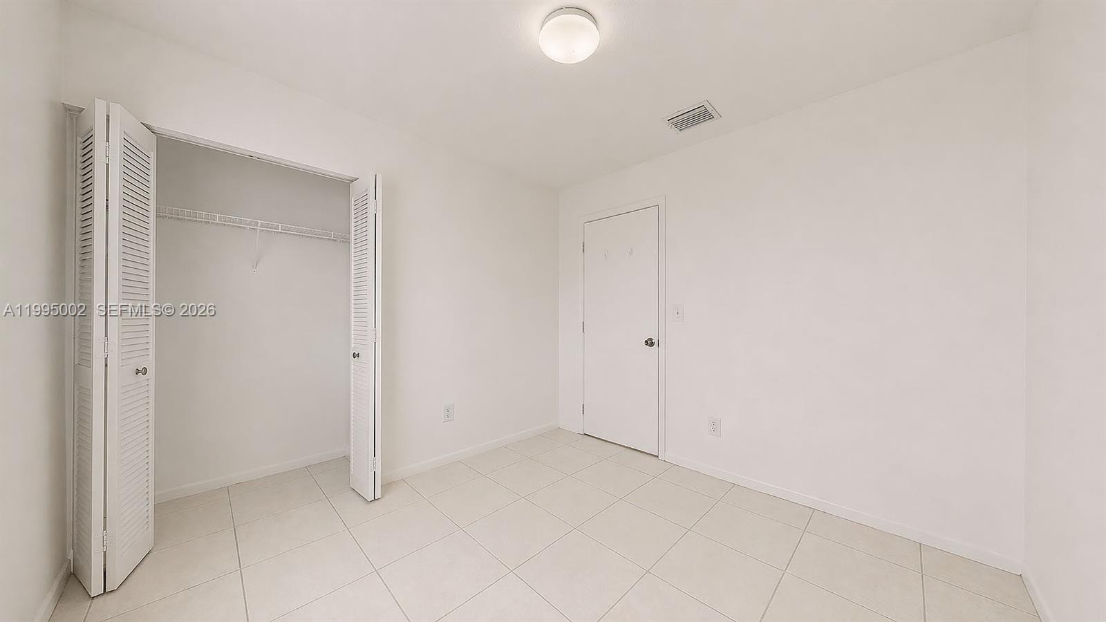 15305 Southwest 104th Avenue Miami, FL 33157 - Photo 43 of 46 a view of an empty room