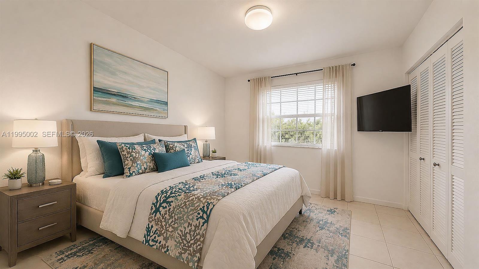 15305 Southwest 104th Avenue Miami, FL 33157 - Photo 44 of 46 a bedroom with a bed and a flat screen tv