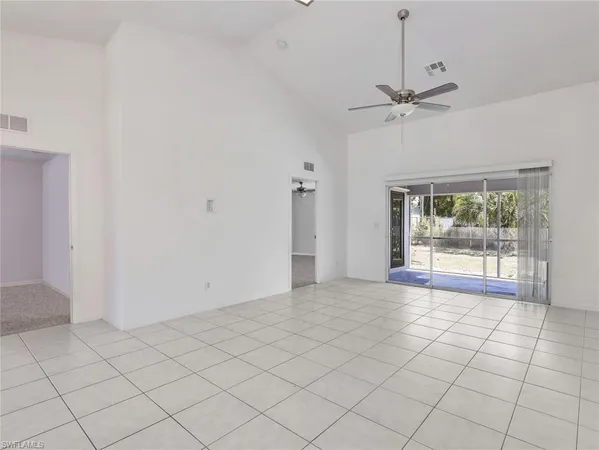 a view of an empty room and window