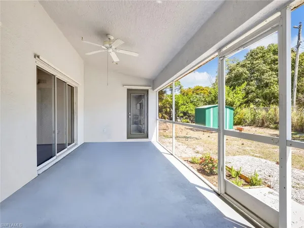 a view of a room with a large window