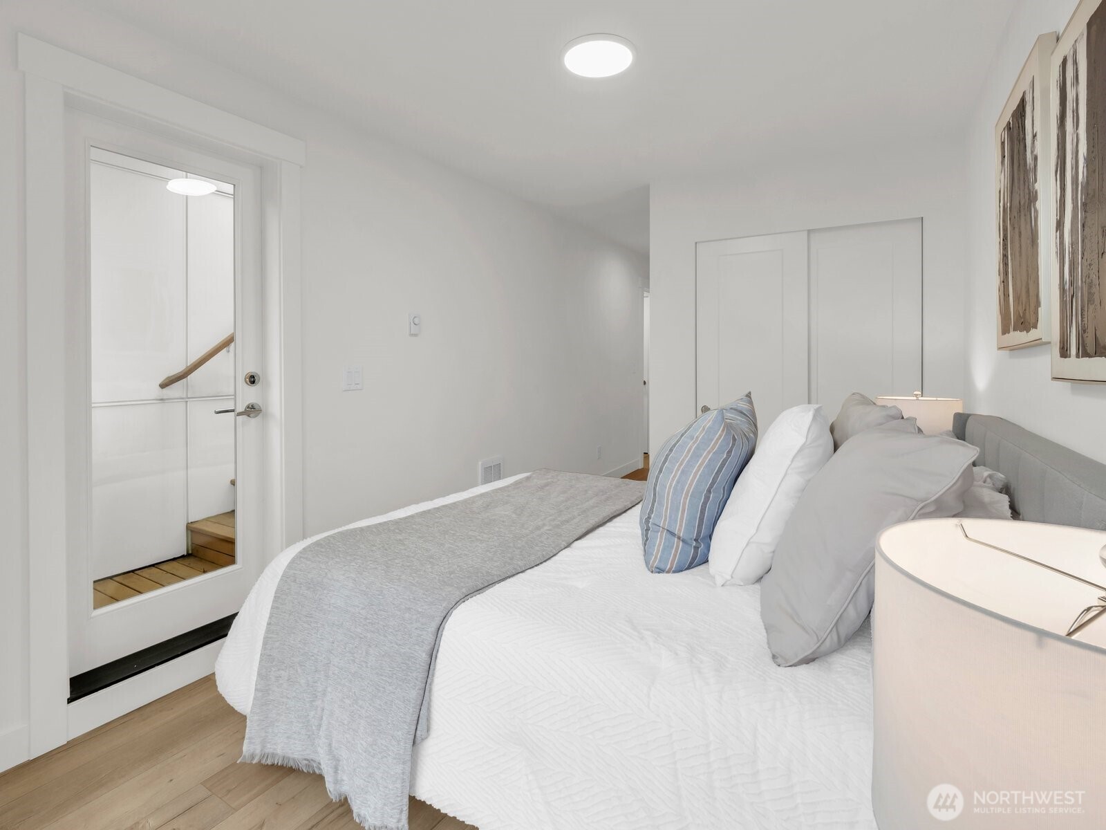 3628 14th Avenue South Seattle, WA 98144 - Photo 20 of 27 a bedroom with a bed and a window
