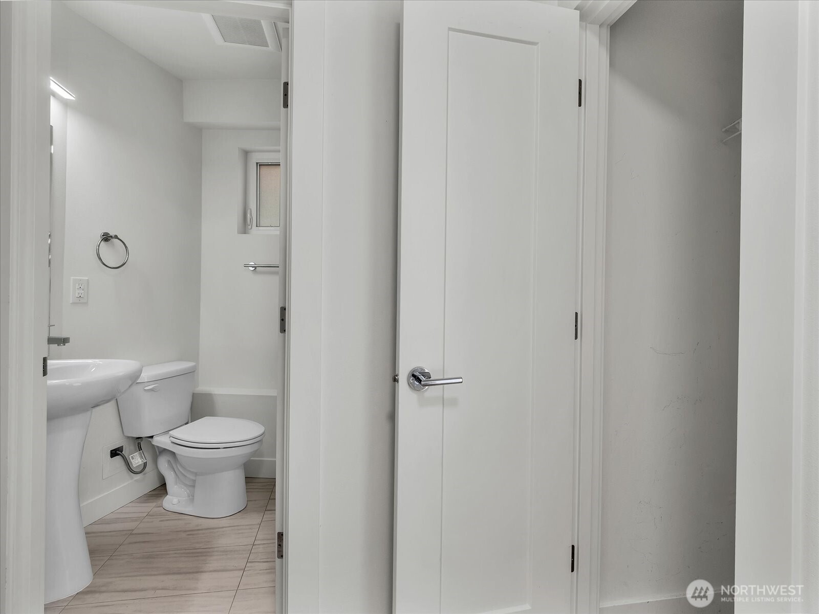 3628 14th Avenue South Seattle, WA 98144 - Photo 4 of 27 a white toilet sitting next to a bathroom sink