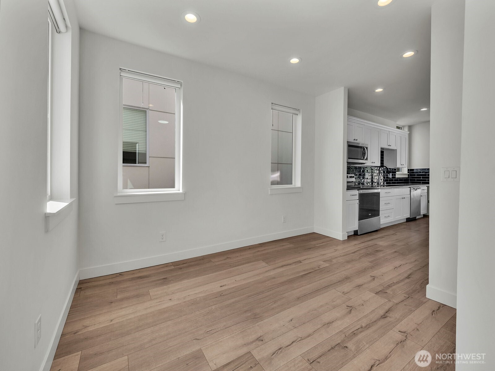 3628 14th Avenue South Seattle, WA 98144 - Photo 8 of 27 a view of kitchen with wooden floor and electronic appliances