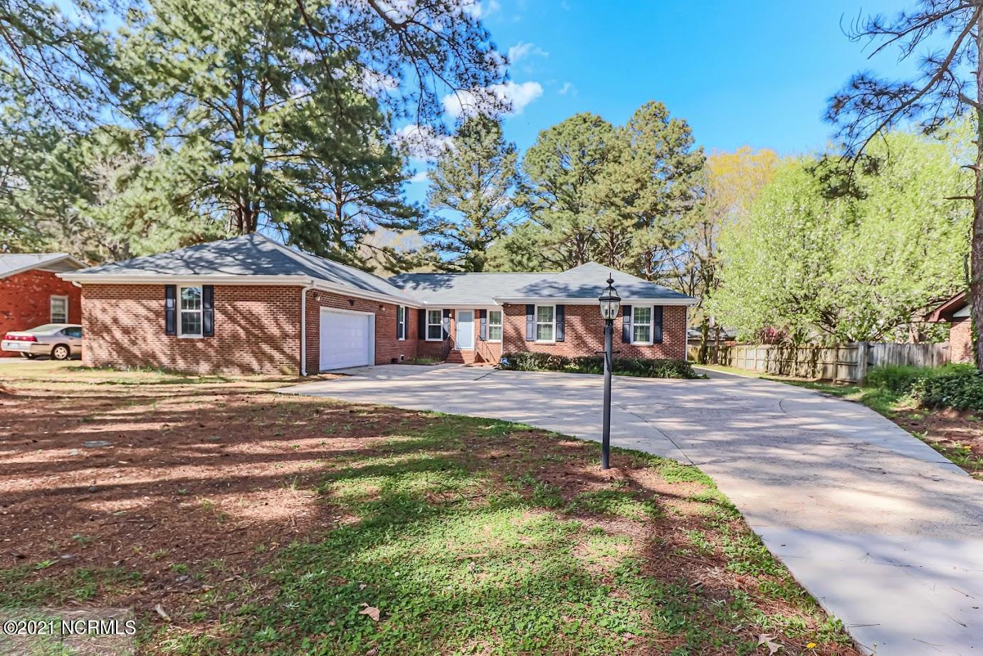 1104 Raleigh Rd Parkway West Wilson, NC 27896 - Photo 1 of 51 1104 Raleigh Front Driveway