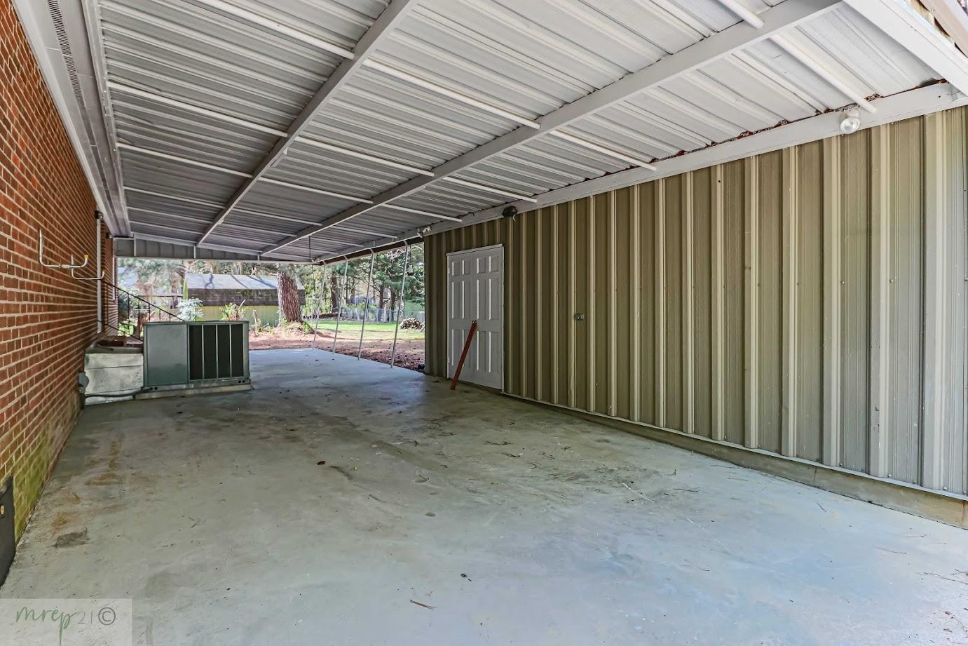 1104 Raleigh Rd Parkway West Wilson, NC 27896 - Photo 9 of 51 1104 Raleigh Back Carport 2