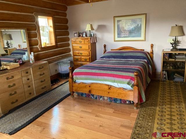 25558 Rd N 6 Loop Cortez, CO 81321 - Photo 13 of 30 a bedroom with bed and window