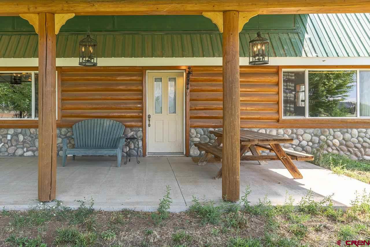 25558 Rd N 6 Loop Cortez, CO 81321 - Photo 30 of 30 a view of a house with backyard and porch
