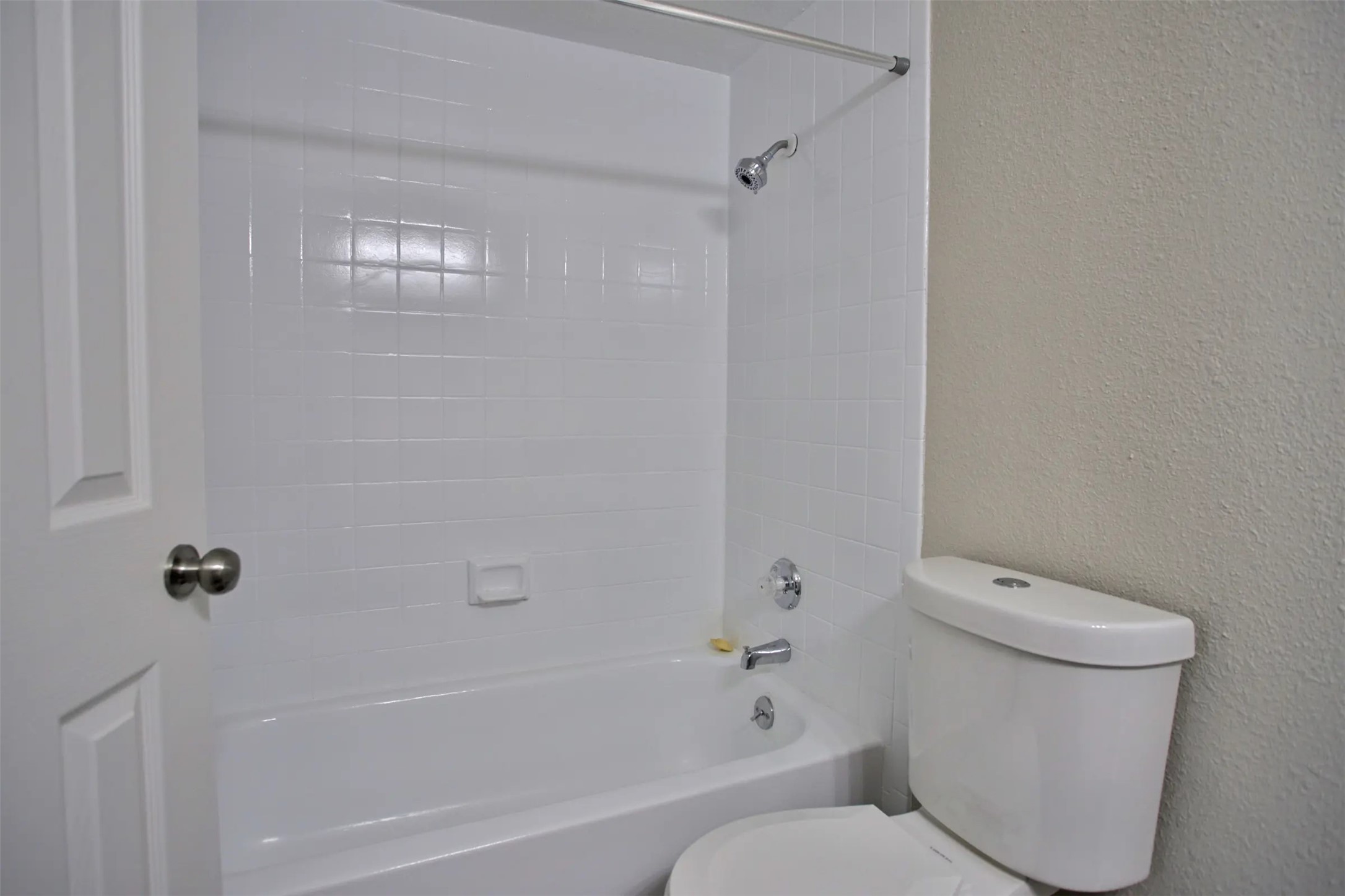 2700 South Dairy Ashford Road, Unit 626D Houston, TX 77082 - Photo 13 of 15 a bathroom with a toilet and shower