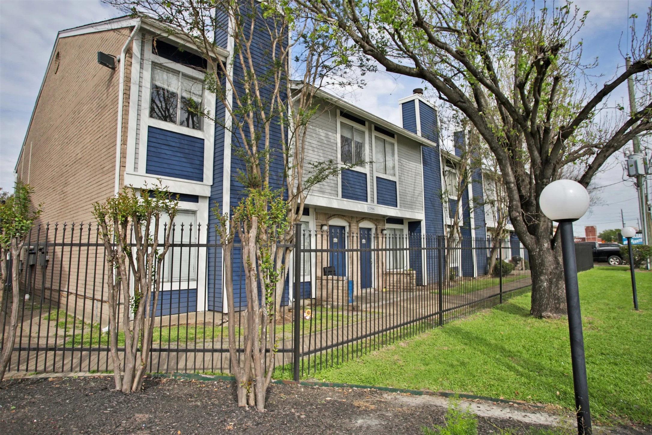 2700 South Dairy Ashford Road, Unit 626D Houston, TX 77082 - Photo 9 of 15 a front view of a house with a yard