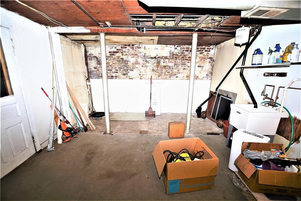 2517 Mt Troy Road Pittsburgh, PA 15212 - Photo 31 of 40 Lower basement addition. Sump pump in left corner. Left of picture exit door to garage.