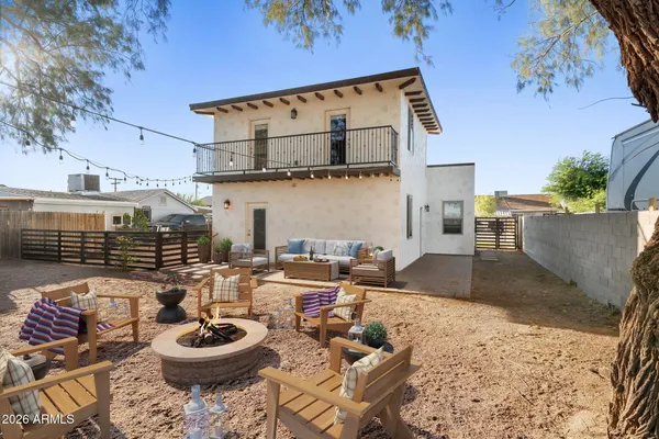 a view of a patio with wooden floor