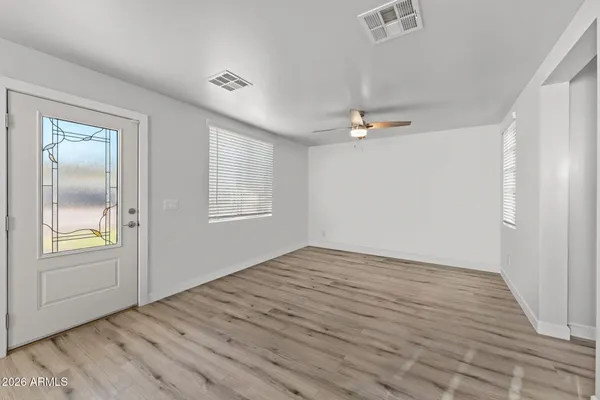a view of an empty room and window