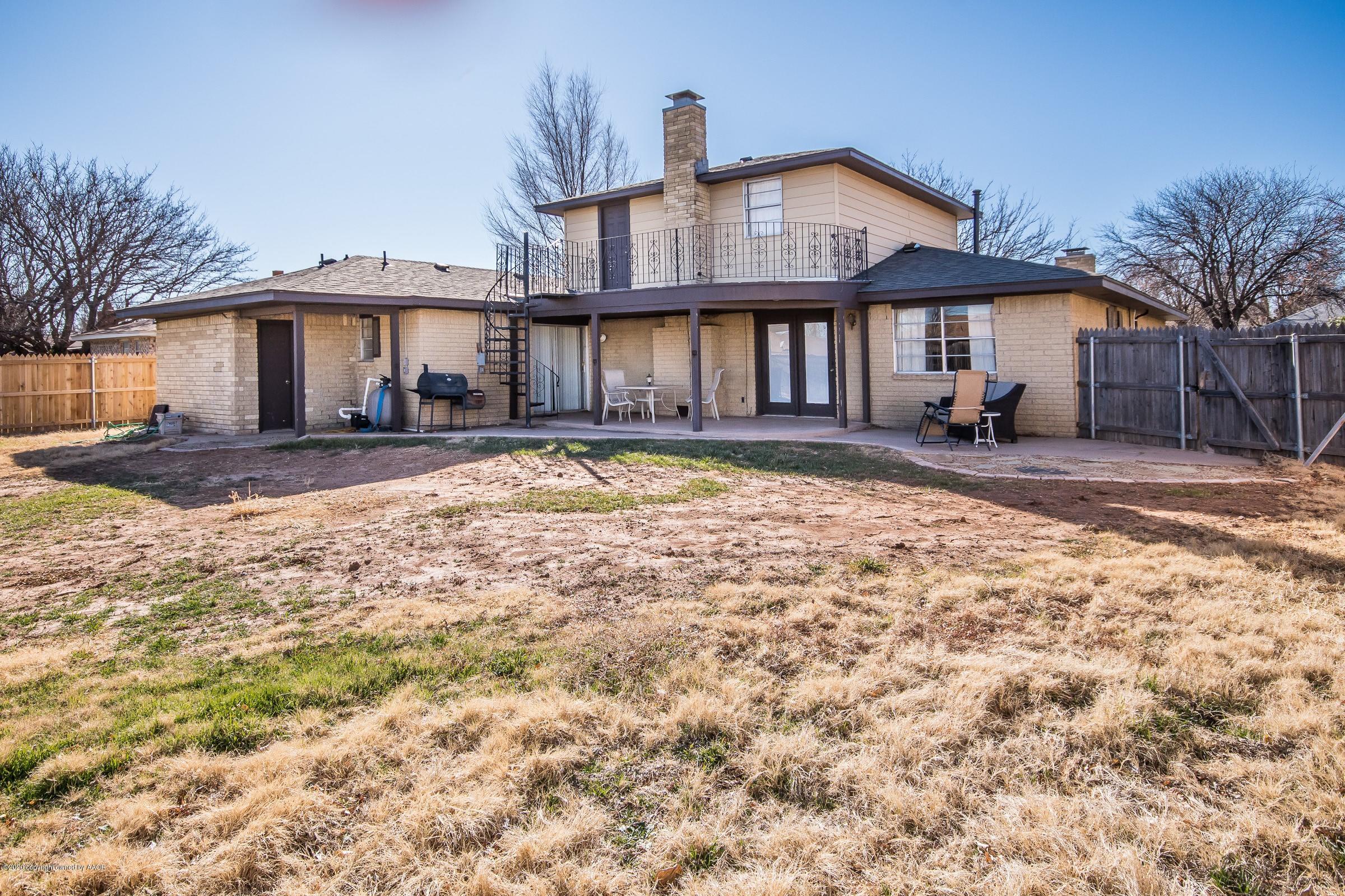 2818 Porter Drive Amarillo, TX 79110 - Photo 23 of 24 a view of a house with a yard and sitting area