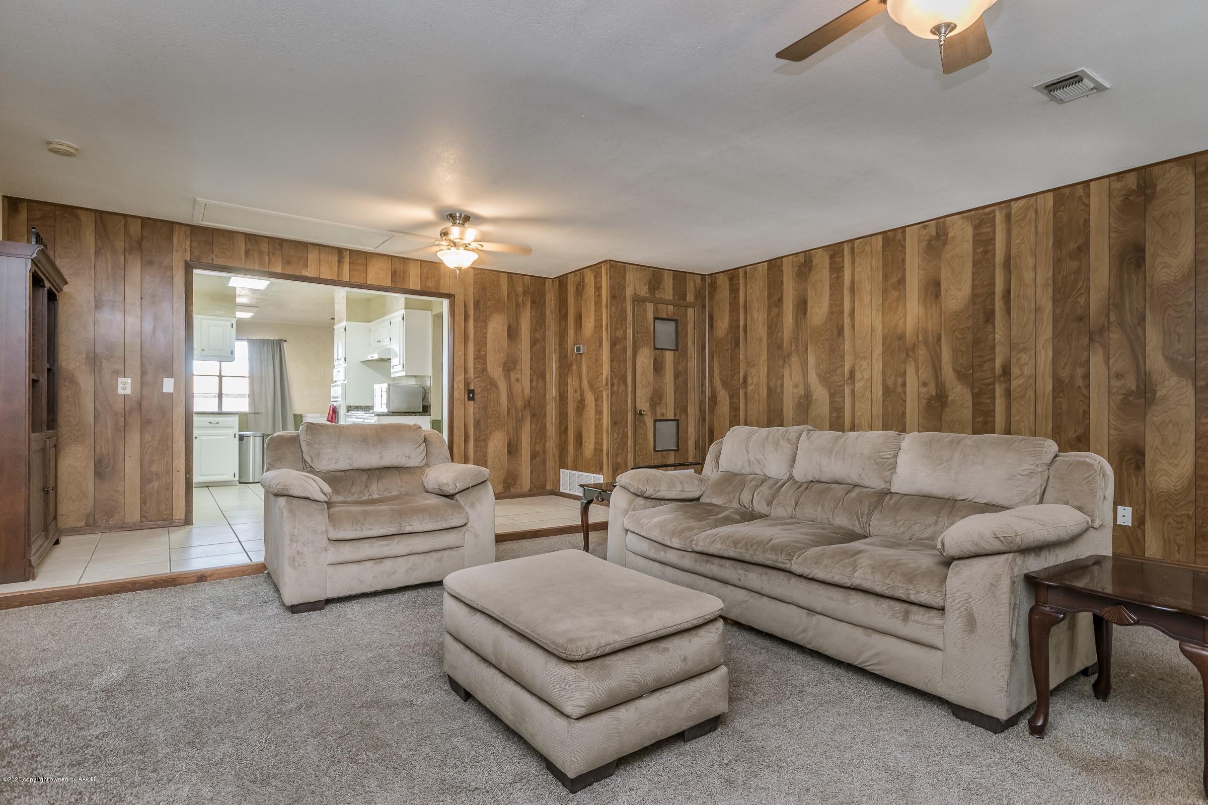 2818 Porter Drive Amarillo, TX 79110 - Photo 9 of 24 a living room with furniture and a large window