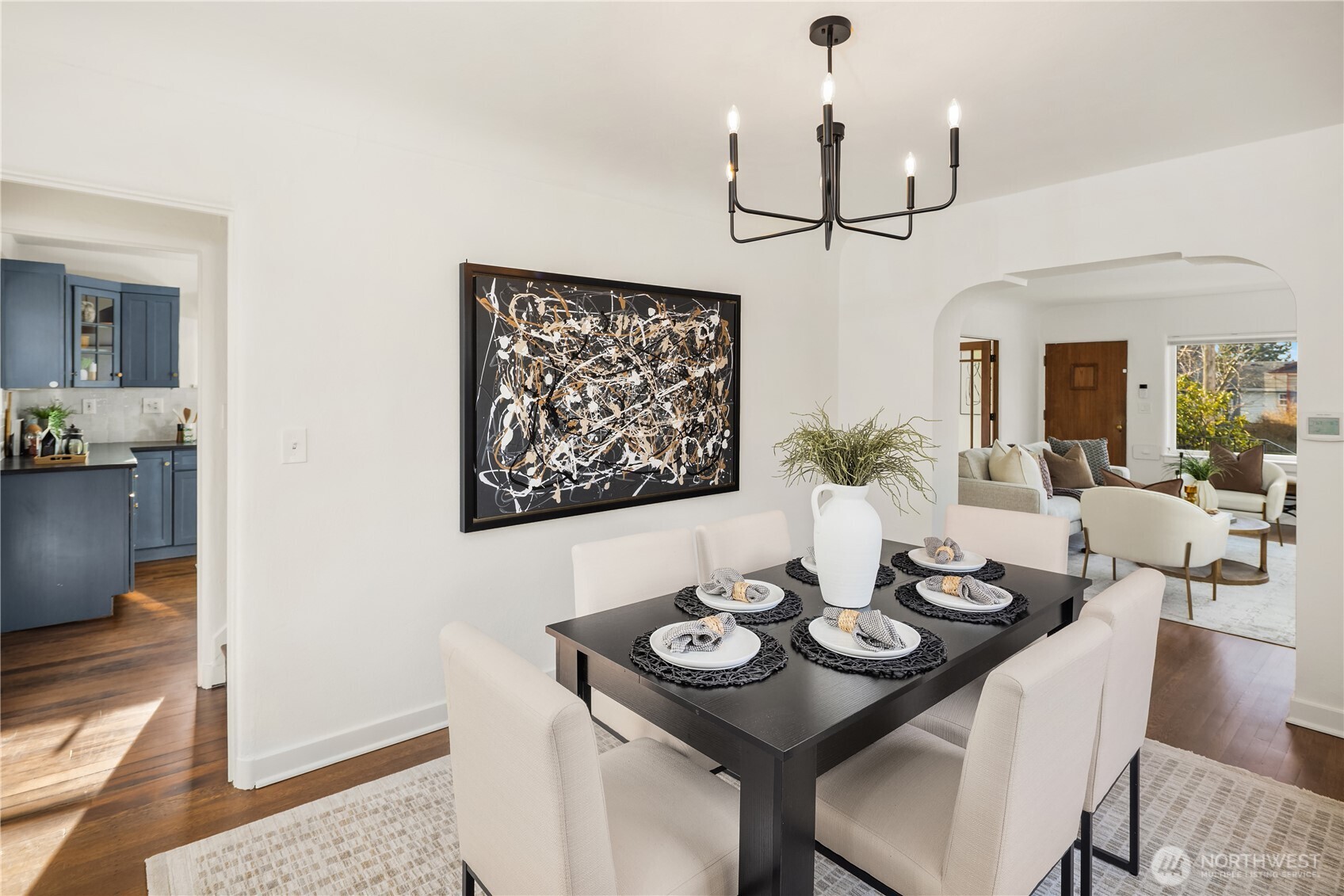 7920 5th Avenue Northeast Seattle, WA 98115 - Photo 11 of 31 a view of a dining room with furniture and chandelier