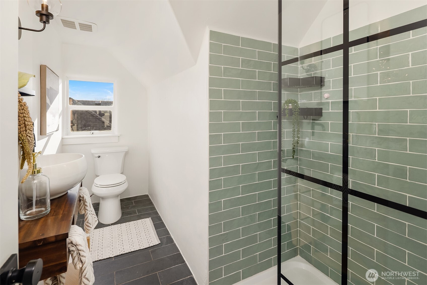 7920 5th Avenue Northeast Seattle, WA 98115 - Photo 20 of 31 a bathroom with a toilet and a shower
