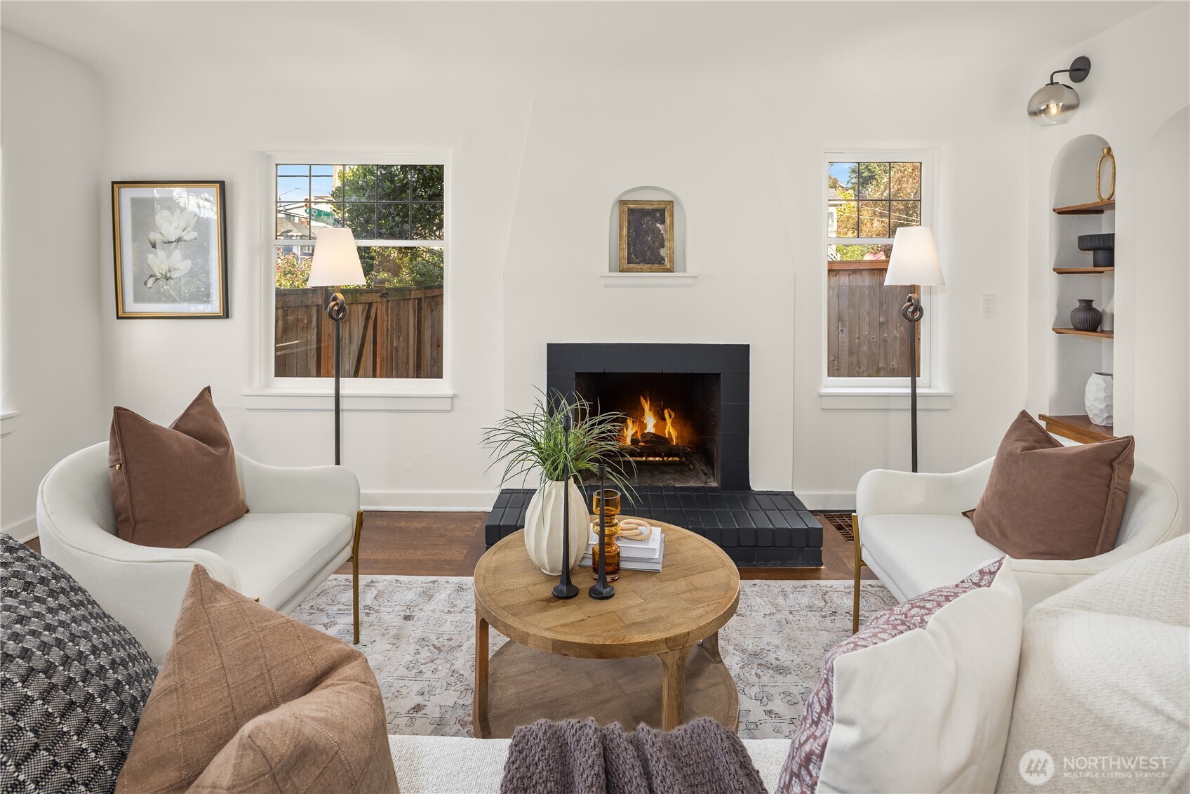 7920 5th Avenue Northeast Seattle, WA 98115 - Photo 5 of 31 a living room with furniture and a fireplace