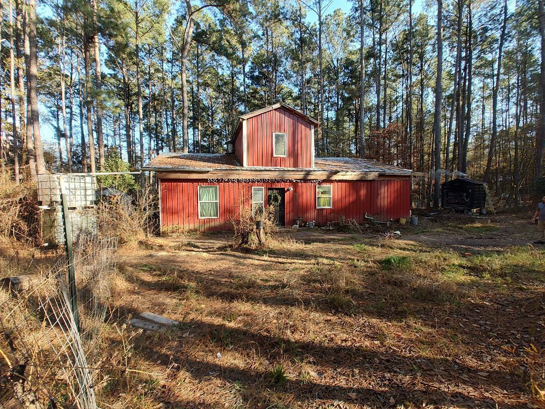 600 Jasper Floyd Road Ponce de Leon, FL 32455 - Photo 5 of 27 a front view of a house with a yard