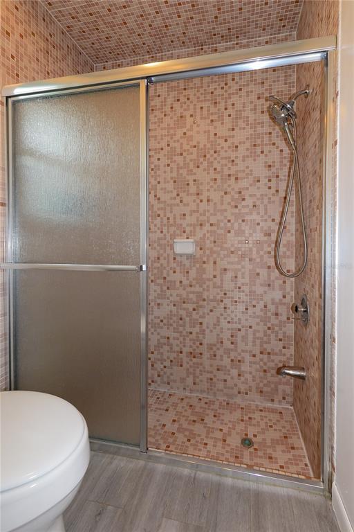 124 Caddy Road Rotonda West, FL 33947 - Photo 27 of 41 a bathroom with a shower