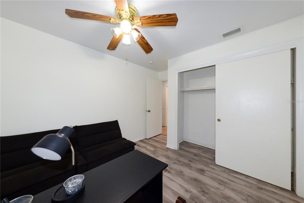 124 Caddy Road Rotonda West, FL 33947 - Photo 30 of 41 a living room with furniture