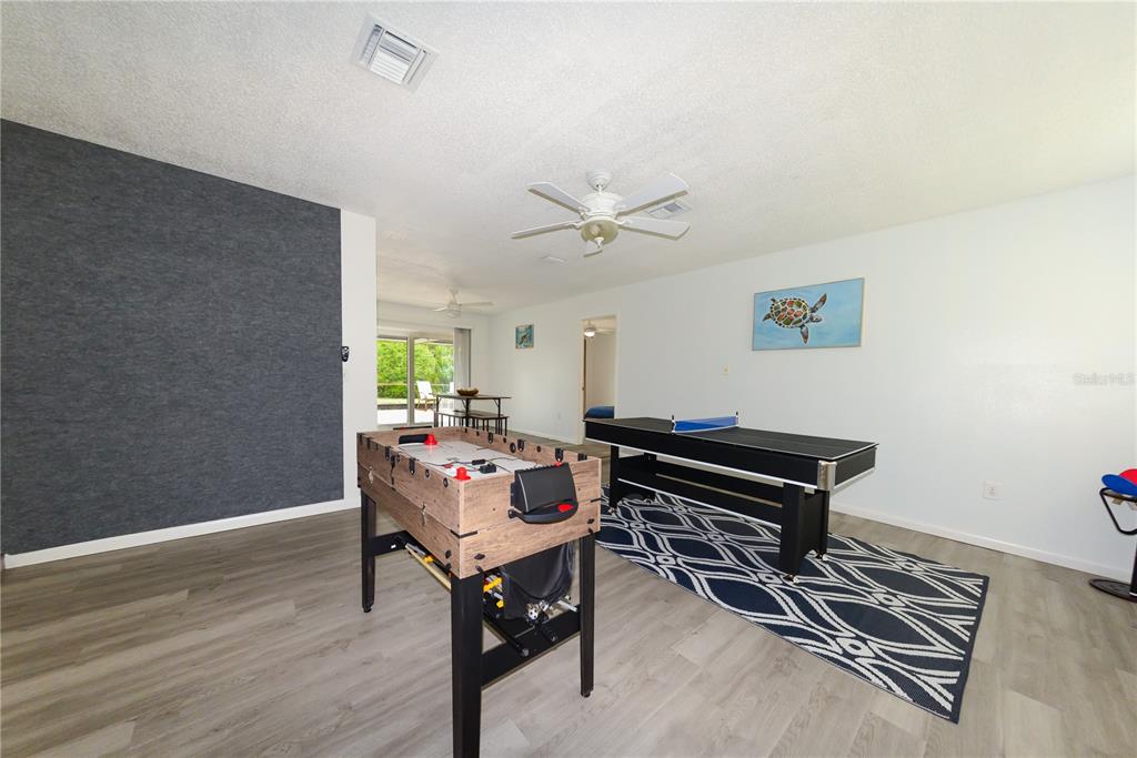 124 Caddy Road Rotonda West, FL 33947 - Photo 9 of 41 a view of a workspace with furniture