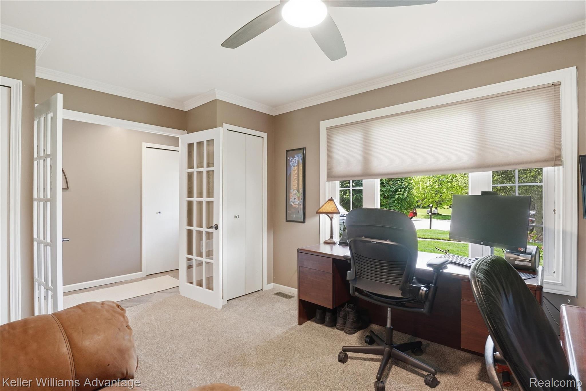 42505 Saltz Road Canton, MI 48187 - Photo 6 of 52 Office space featuring light colored carpet, ceiling fan, crown molding, and french doors