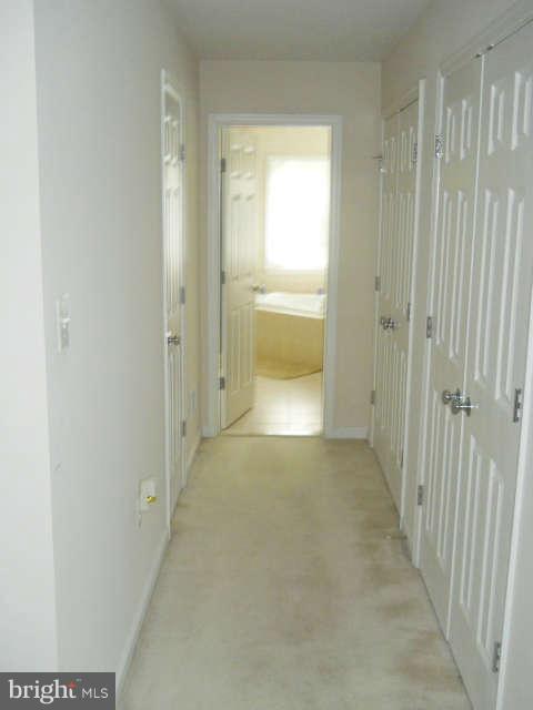 3602 Lions Field Road Triangle, VA 22172 - Photo 14 of 22 a view of a bathroom with a glass door and a shower