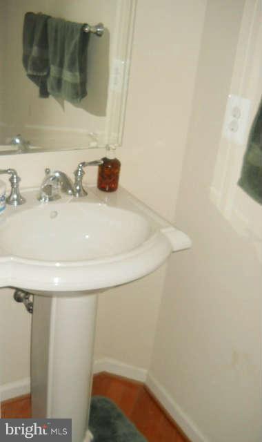 3602 Lions Field Road Triangle, VA 22172 - Photo 10 of 22 a bathroom with a sink