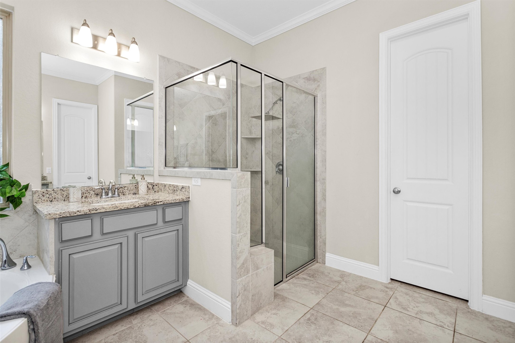 3622 Lister Drive Rosharon, TX 77583 - Photo 21 of 44 a bathroom with a granite countertop sink a mirror and a shower