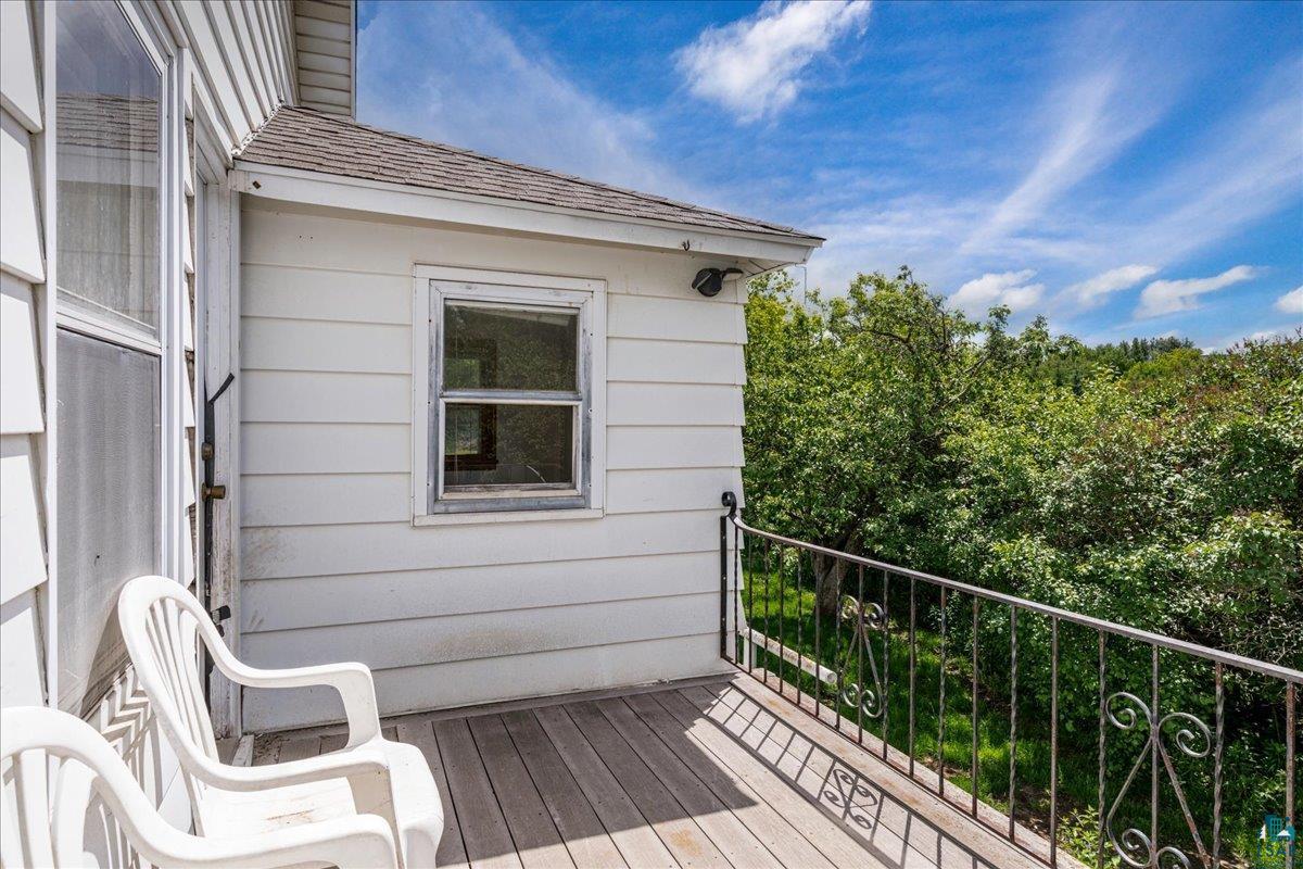 424 East Upham Road Duluth, MN 55811 - Photo 22 of 38 Outdoor deck with wood-finish flooring and decorative metal railing