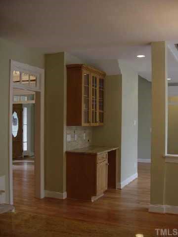 7224 Spring Meadow Lane Raleigh, NC 27606 - Photo 2 of 10 View from Kitchen towards Wine Bar & Family Room. Note the open Feeling.