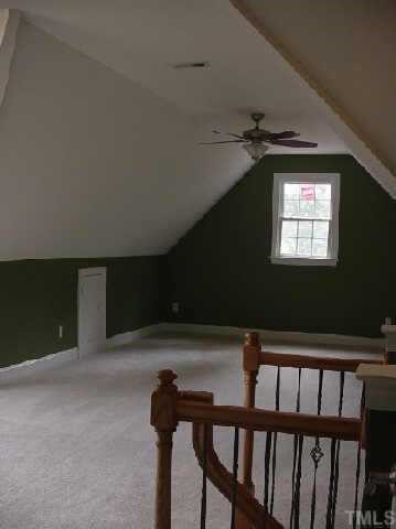 7224 Spring Meadow Lane Raleigh, NC 27606 - Photo 8 of 10 View of large bonus room's media area. Other part of bonus room has full height ceilings
