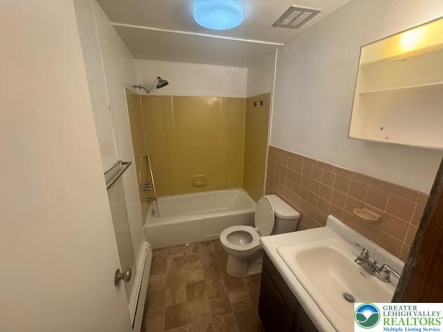 2565 Gap View Road, Unit 1 2565 Slatington, PA 18080 - Photo 7 of 11 a bathroom with a sink a toilet and shower