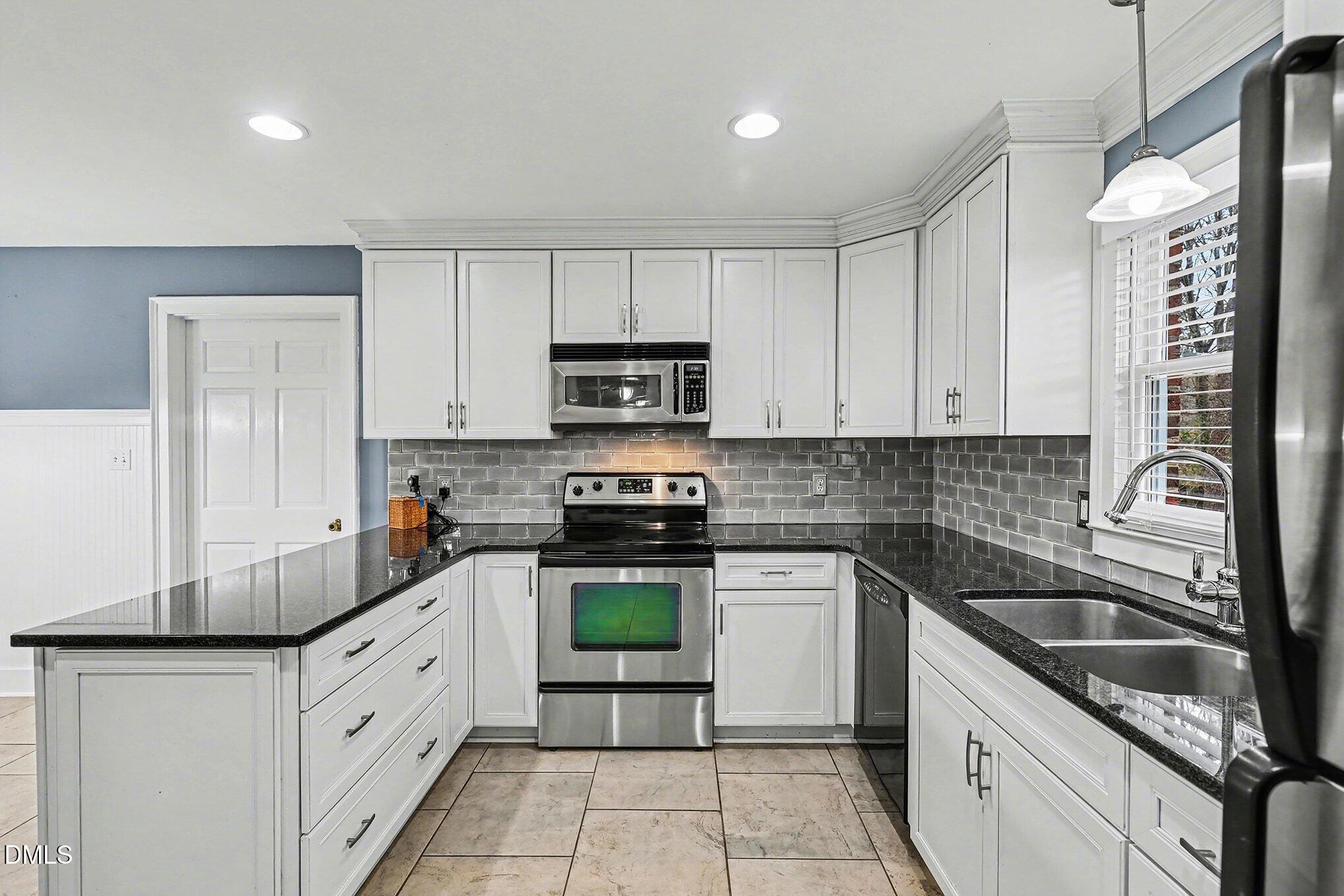 2529 Countrywood Road Raleigh, NC 27615 - Photo 9 of 35 015_file_3511
