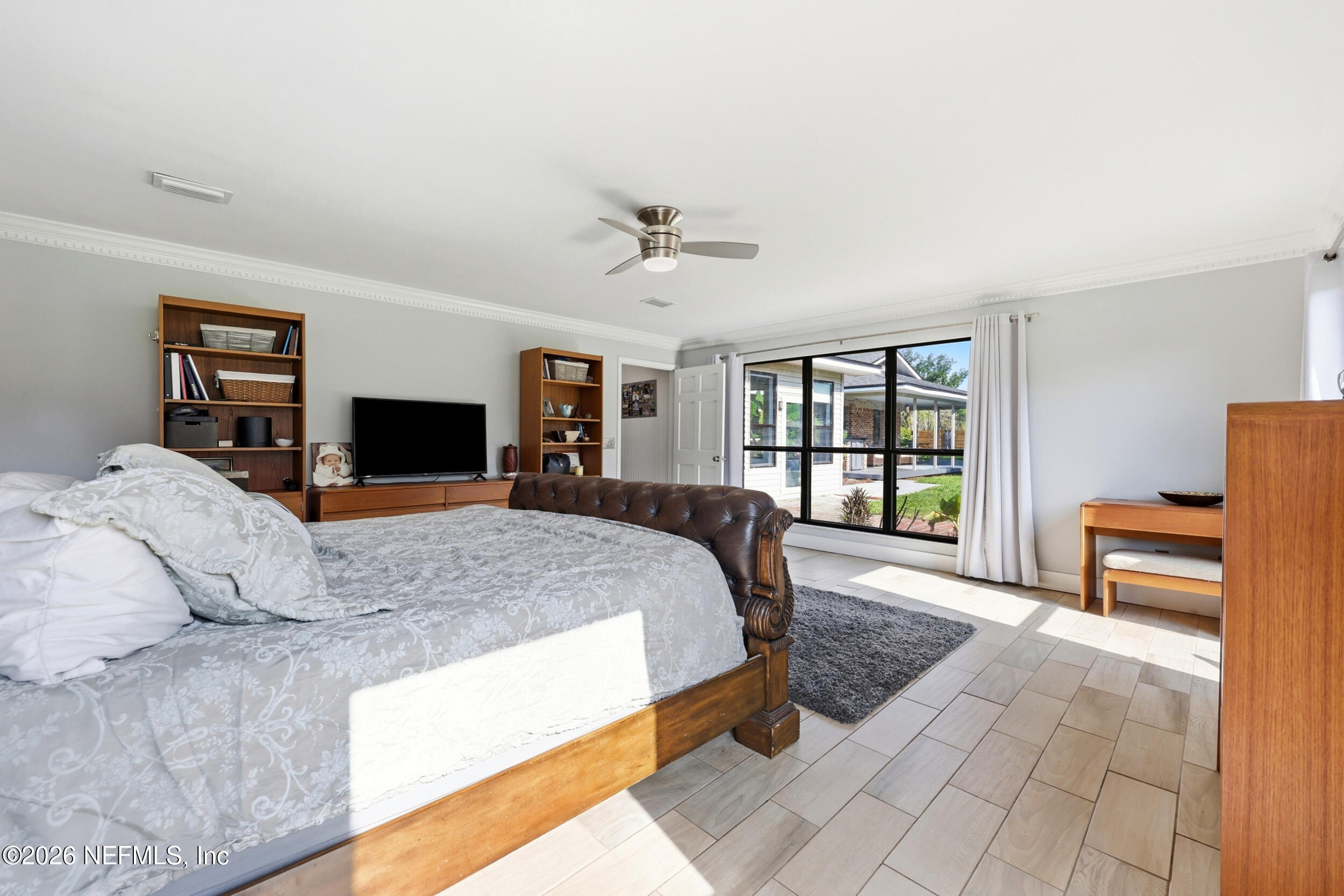 11627 Mandarin Terrace Road Jacksonville, FL 32223 - Photo 9 of 79 a bed room with a bed and a television