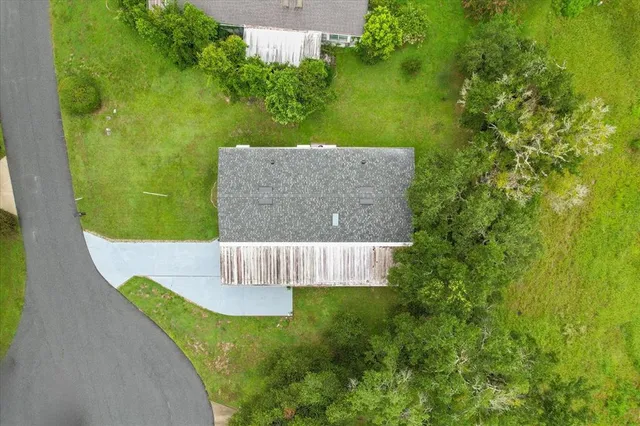 a view of swimming pool in a backyard