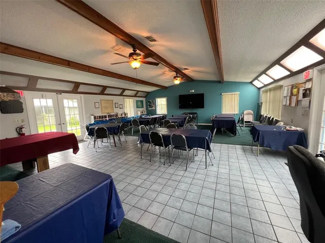a view of a dining room with furniture