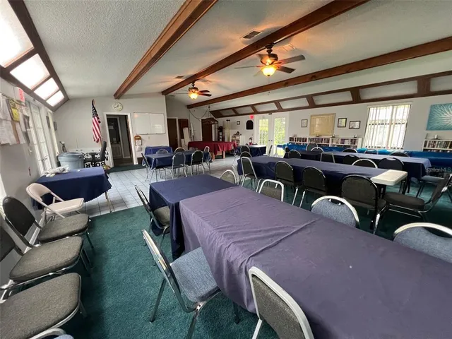 a view of a livingroom with furniture window and outside view