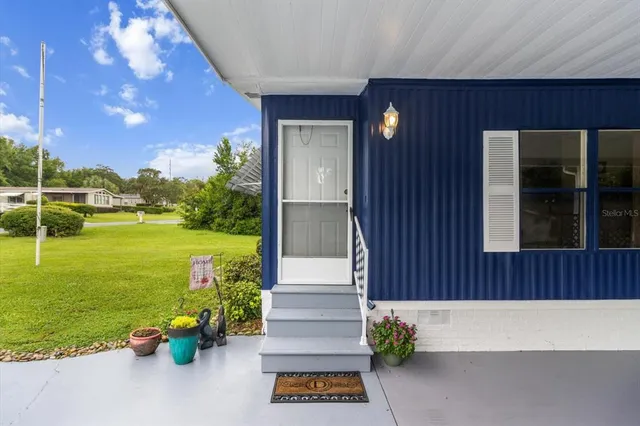 a front view of a house with ocean view